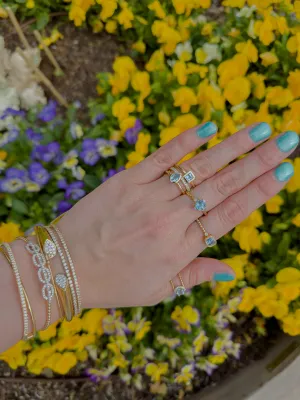 Bezel Set Blue Topaz and Diamond Ring