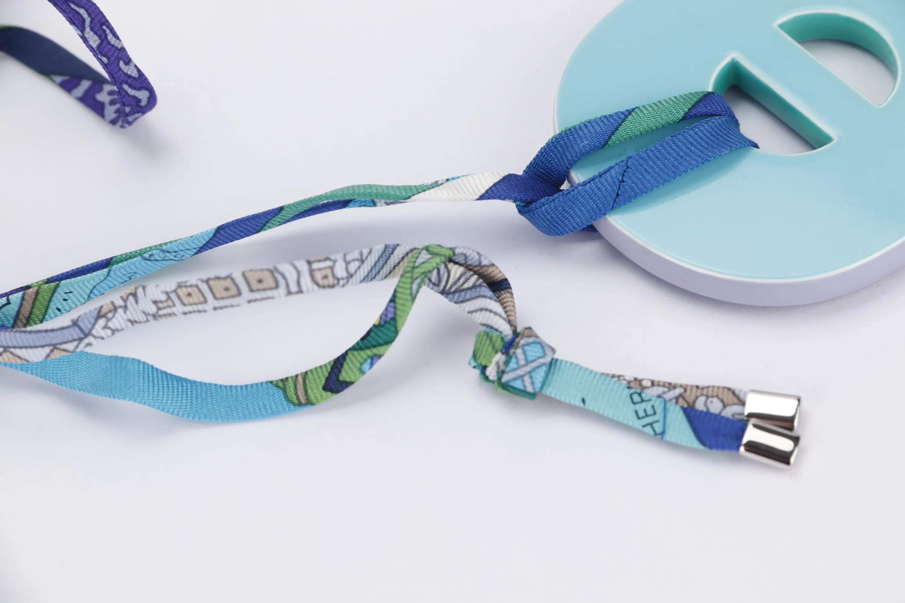 HERMES BUFFALO HORN NECKLACE BLUE, TURQUOISE SILK STRAP, WITH DUST COVER
