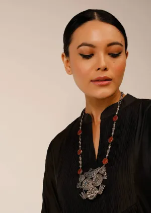 Oxidised Silver Long Necklace With Intricately Carved Temple Pendant And Orange Carved Stones